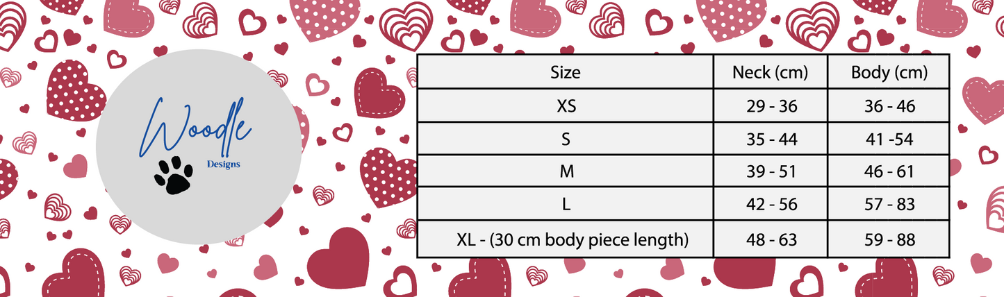 Measurement chart for dog coats with heart pattern, Woodle brand logo, and size chart.