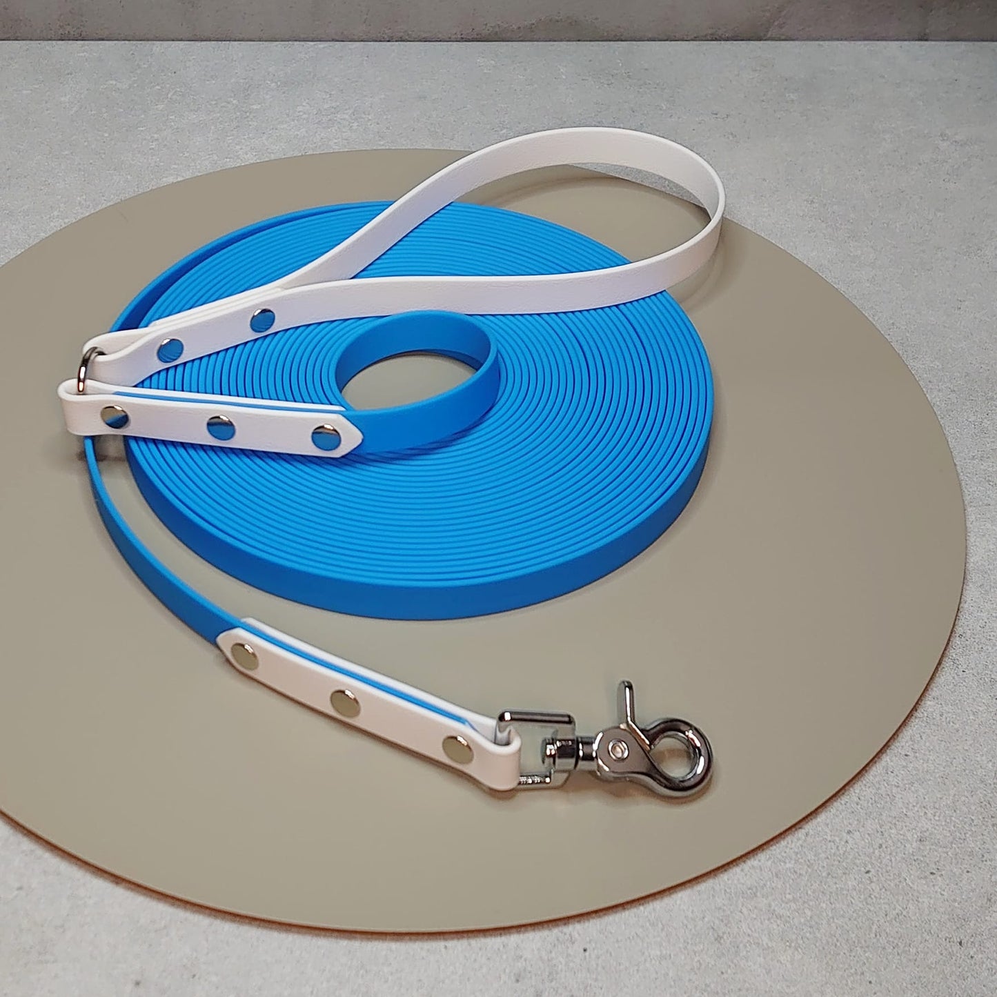 a waterproof long line for dogs giving them extra space and freedom to roam, handmade in Ireland, made for dogs, design your own
Custom two-tone waterproof long line made from PVC coated webbing - Professional dog training lead - Woodle Designs Ireland.