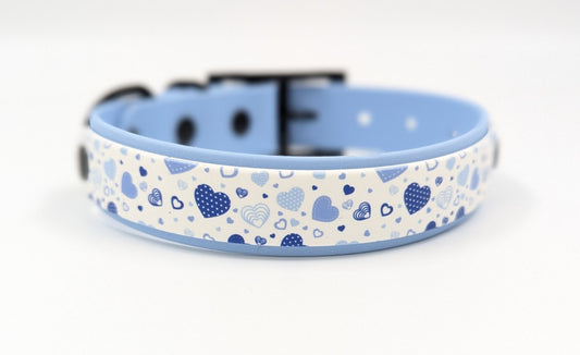 Handmade BioThane dog collar in blue with a layer of UV printed BioThane in cute blue hearts pattern Ireland worldwide